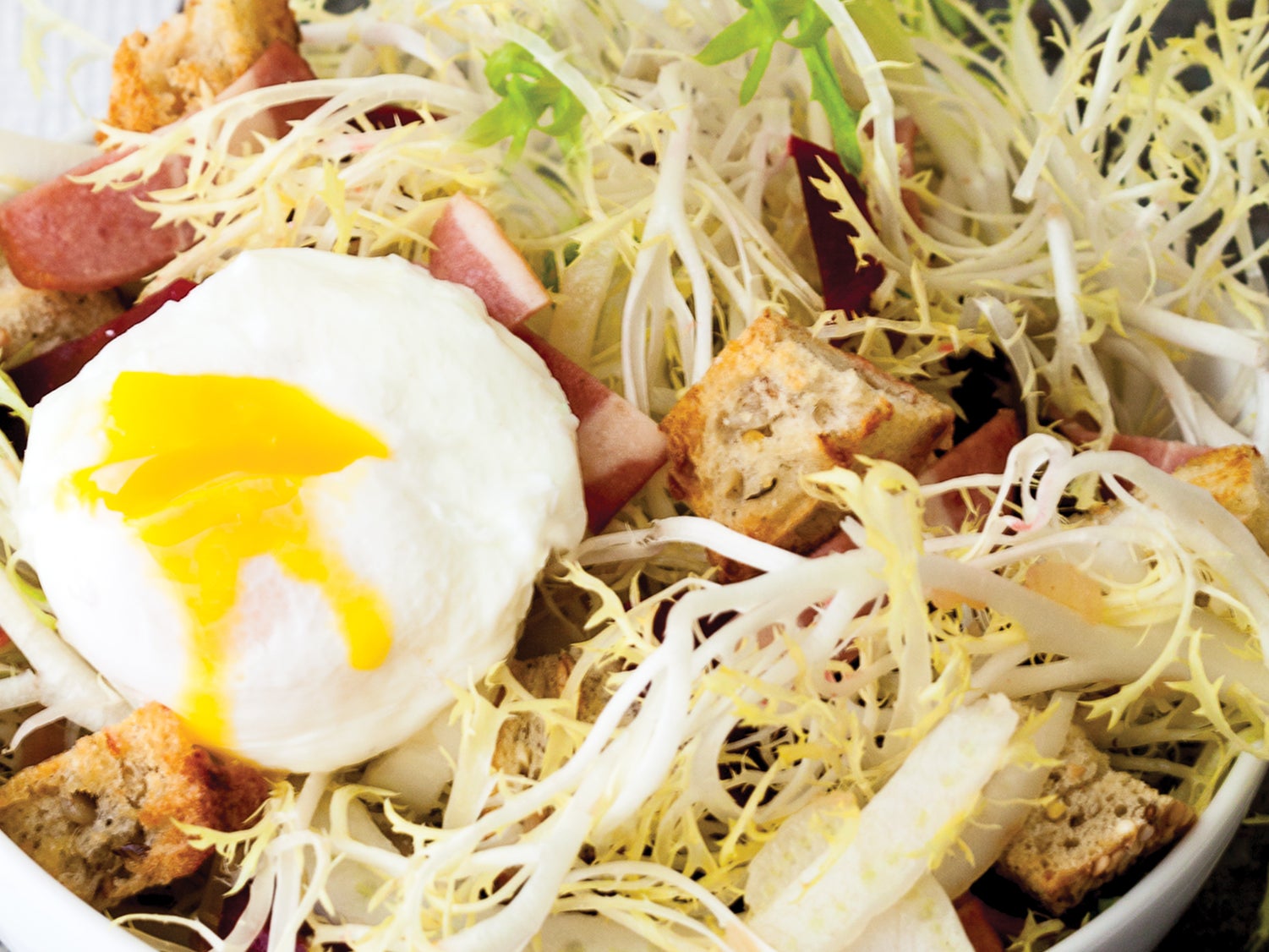 Frisee Salad With Turkey Bacon Poached Eggs Recipe