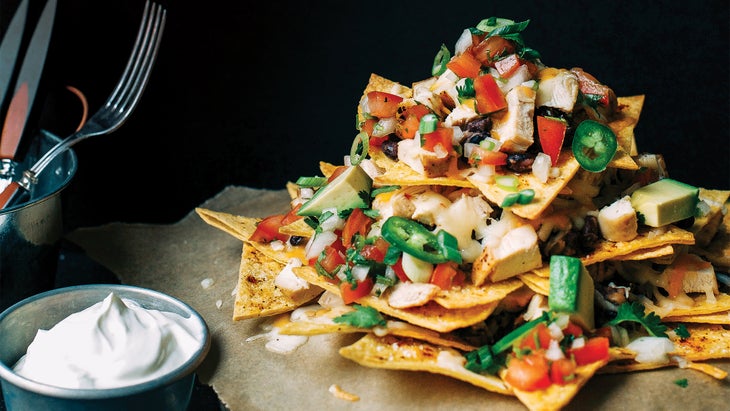 Restaurant Style Nachos Grande with Homemade Refried Beans and Pico de Gallo Photo by Restaurant Style Nachos Grande with Homemade Refried Beans and Pico de Gallo