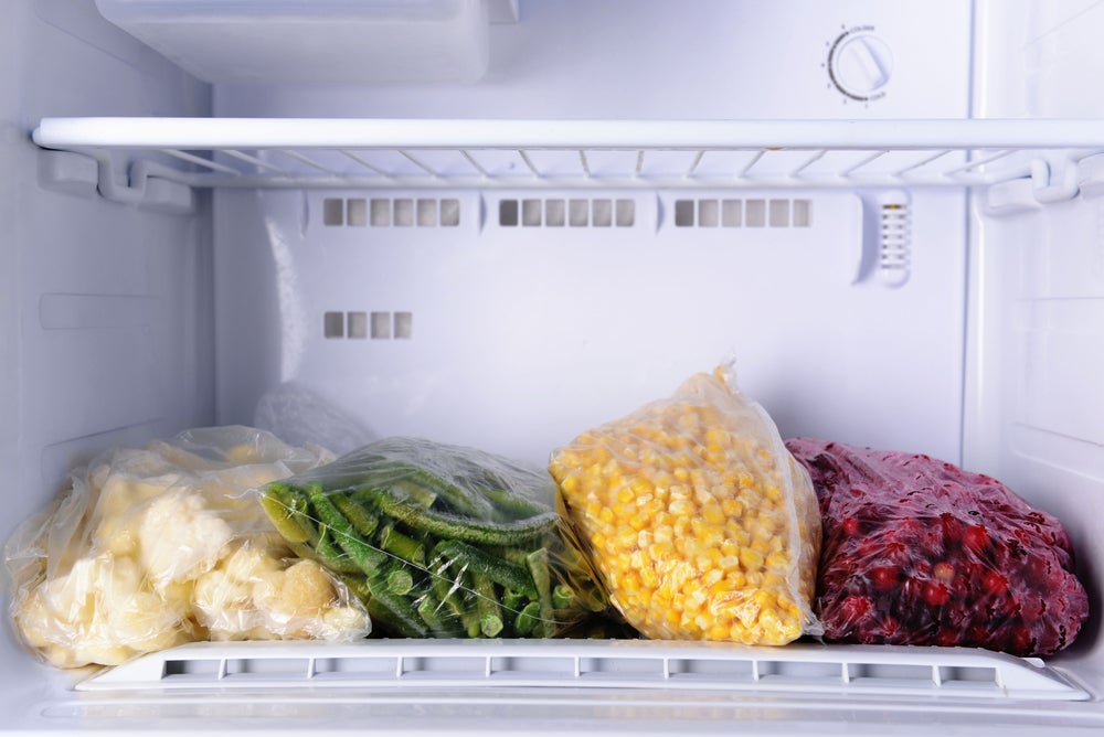 Frozen vegetables stored in freezer.