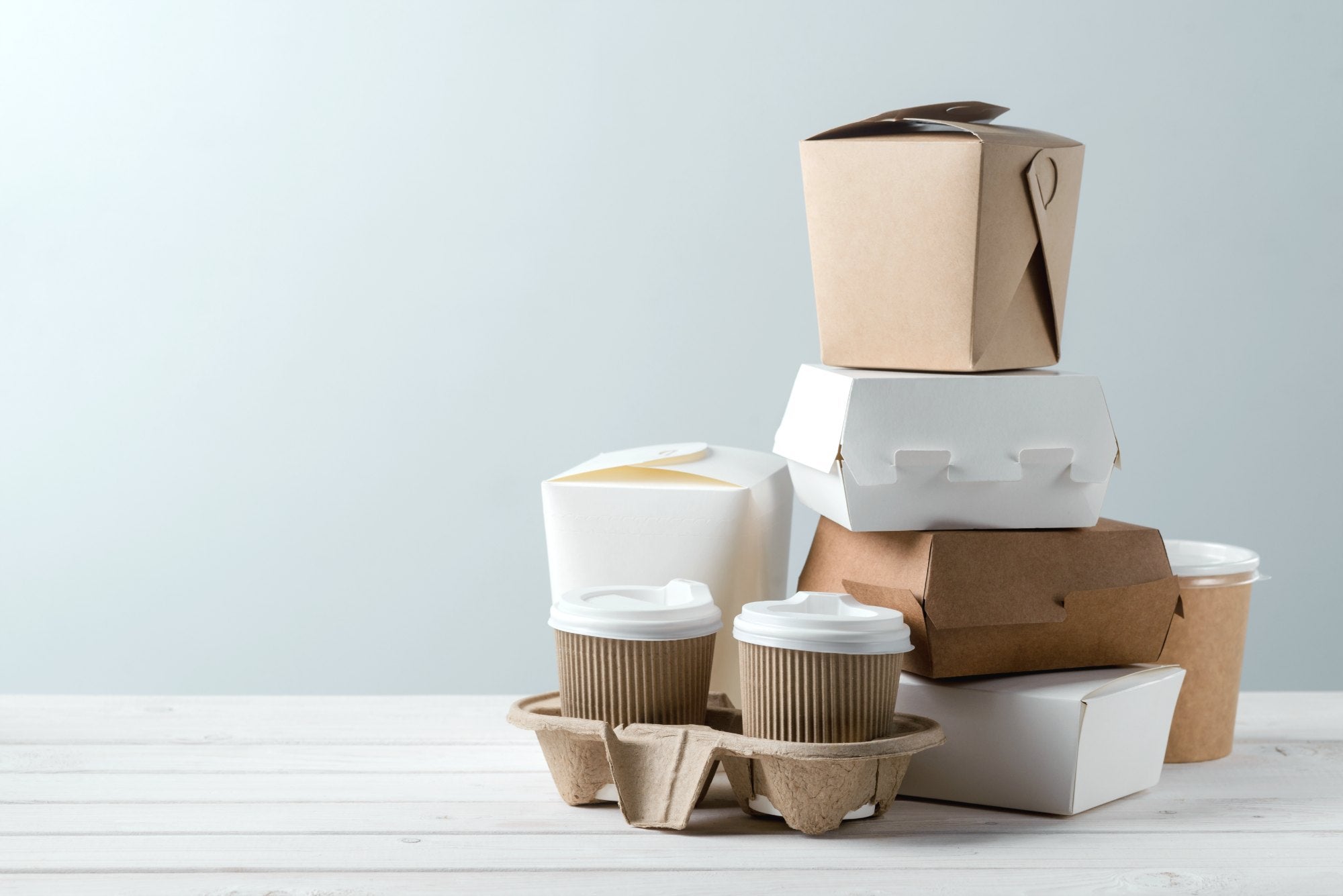 Takeout containers piled high