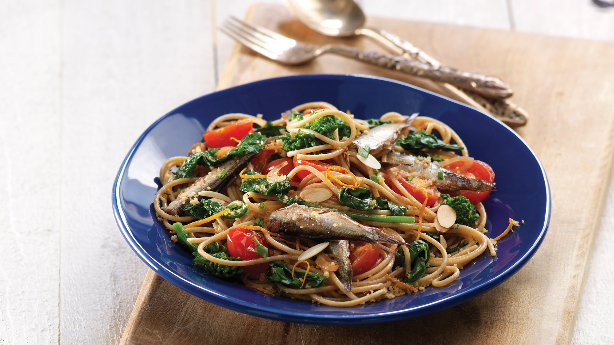 Sardine and Cherry Tomato Spaghetti with Orange Breadcrumbs recipe - Feeling low energy? How's your mood, a little blue? The culprit may be your thyroid. Counteract thyroid issues with these clean eats.