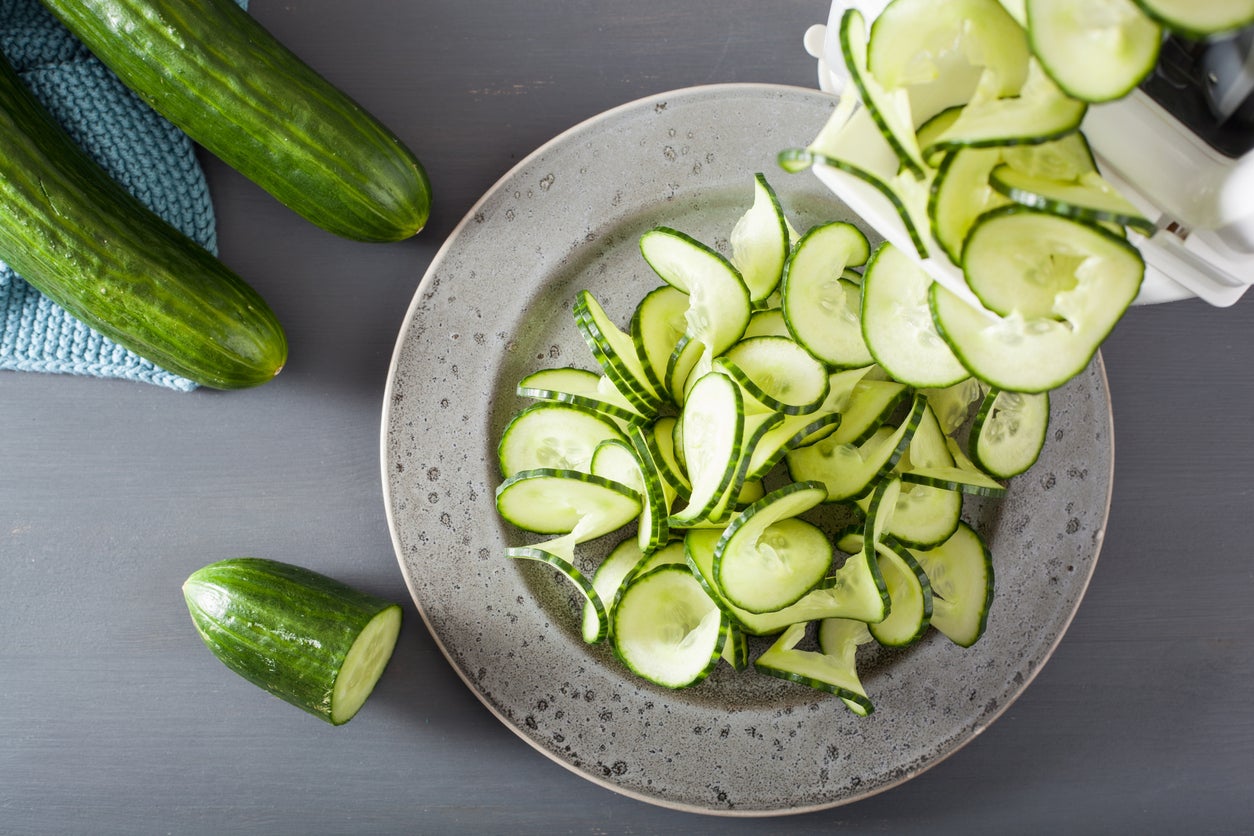 spiralizing cucumber vegetable with spiralizer