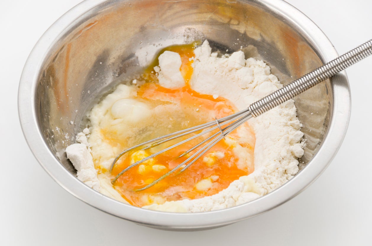 Mixing Flour and eggs in bowl, making Tempura Flour
