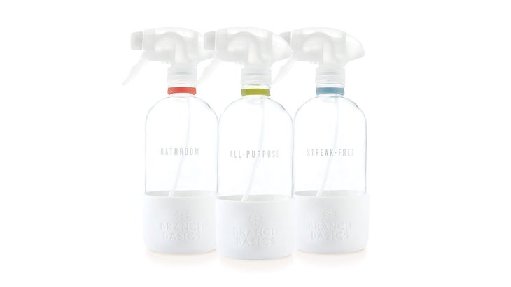 Three clear spray bottles