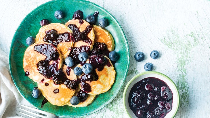 Lemon pancakes with with Blueberry Chia Jam on a plate