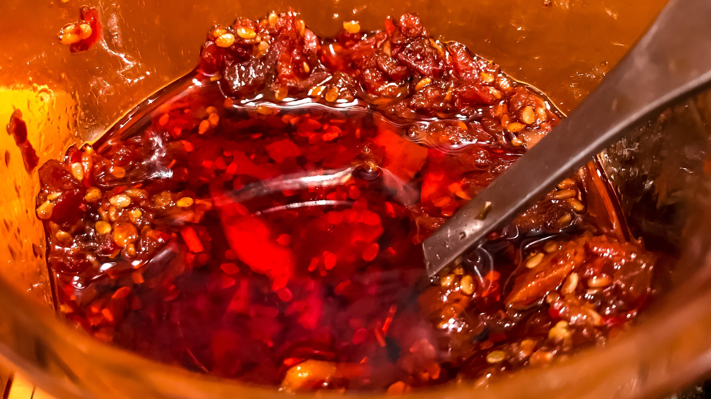 Close up of bowl of chile crisp.
