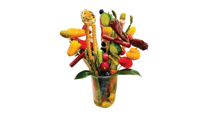 Bouquet of charcuterie on skewers in a jar