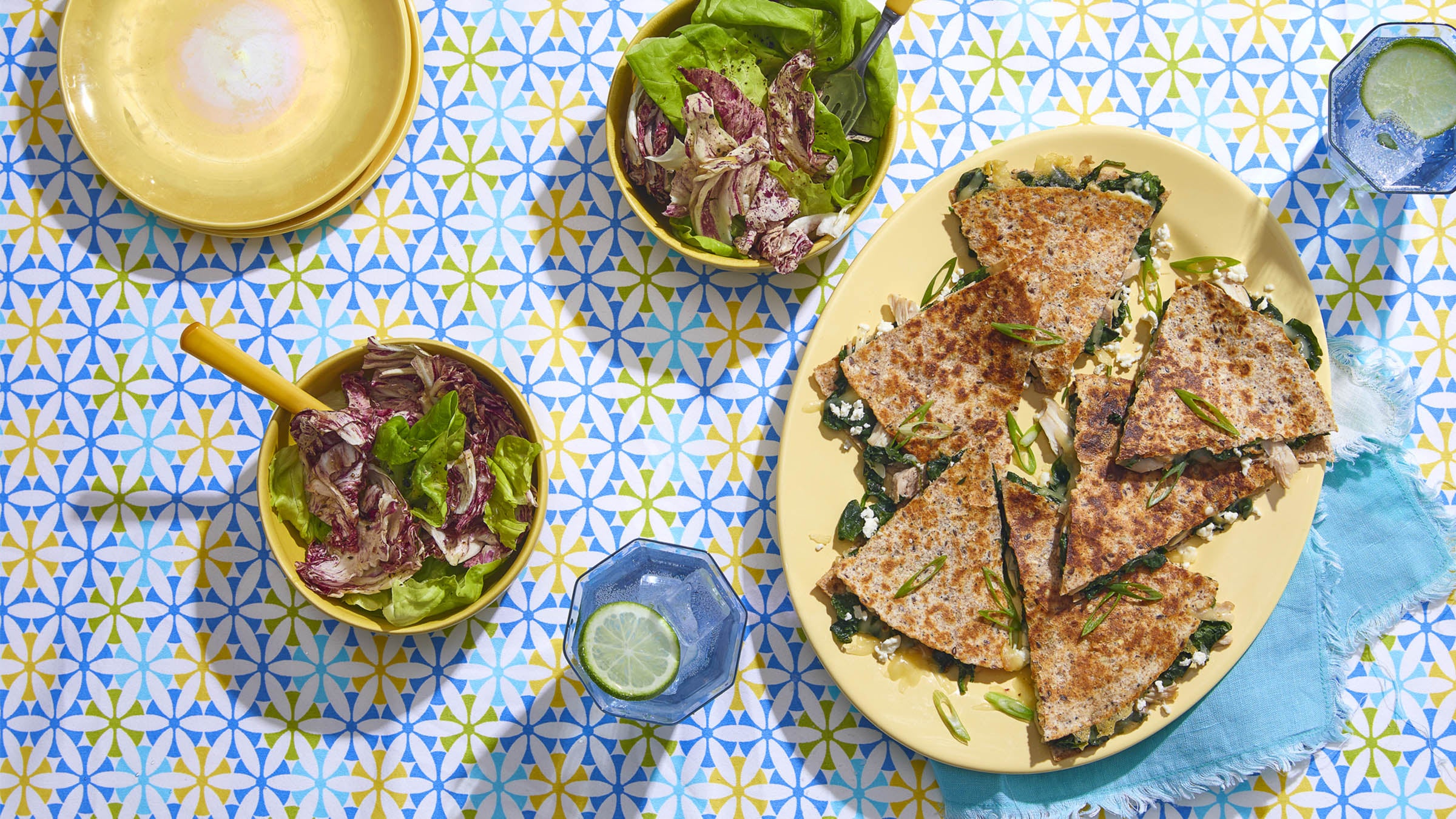 Spanakopita quesadillas on patterned table