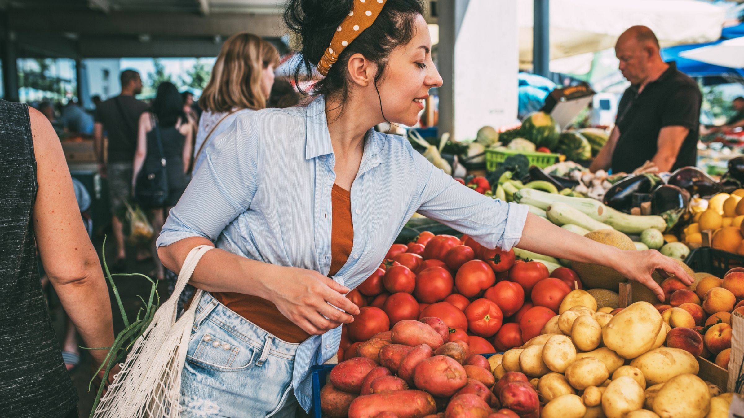 Woman shopping for organic produce
