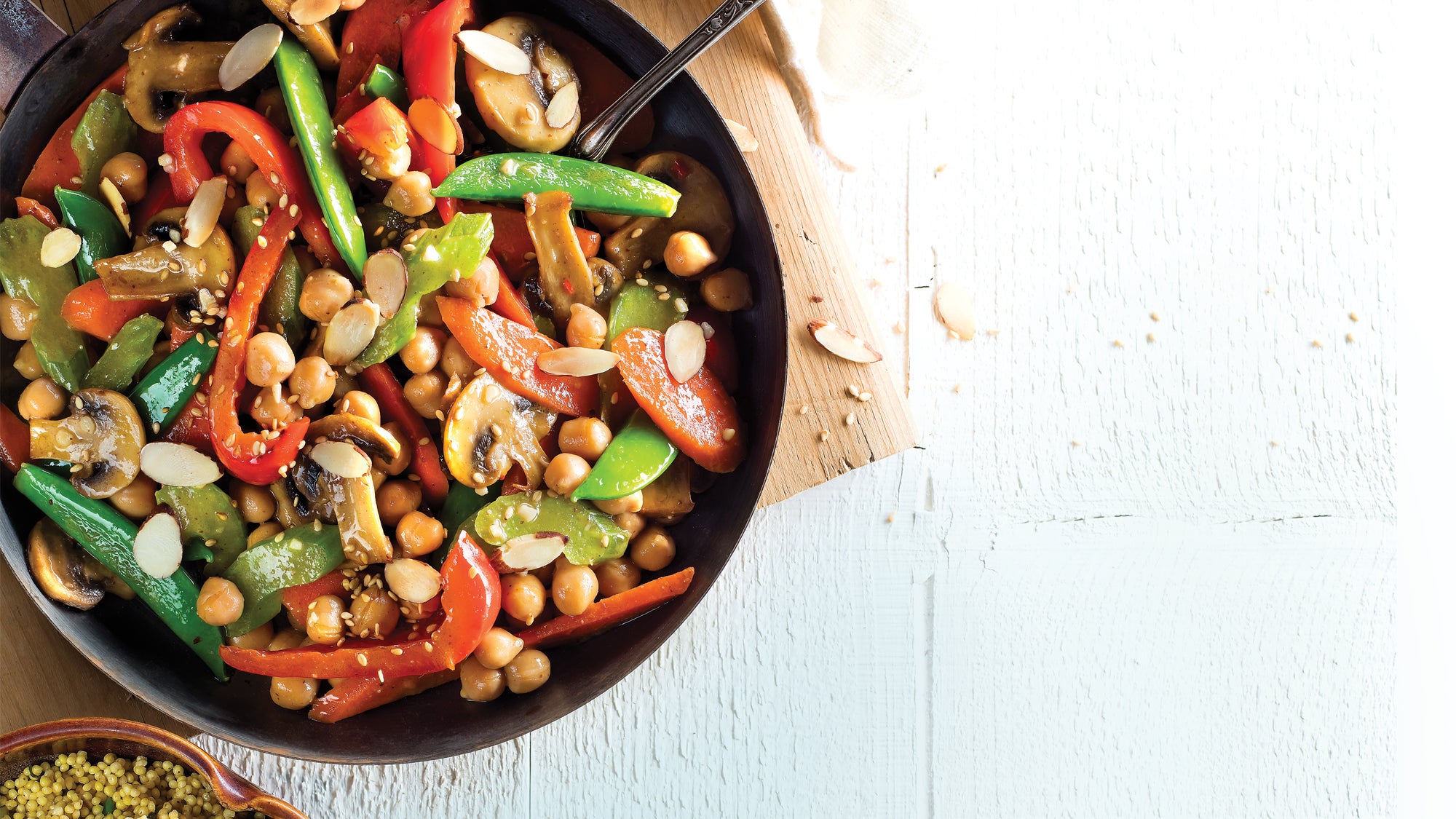 Kung Pao Chickpea Stir-Fry Over Sesame-Fried Millet 55 web Fiber-rich zero cholesterol vegetarian Chinese recipe