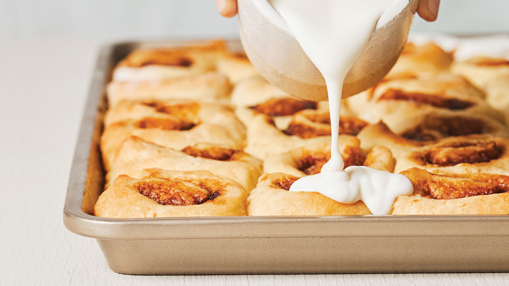 Sheet-Pan Mini Cinnamon Buns with Yogurt Drizzle recipe